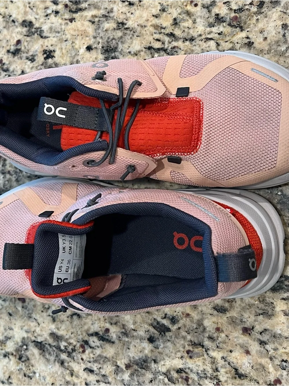 On Running Kids Sneakers in Pink and Red with Navy Accents